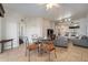 Dining area with small table and chairs near living room at 8763 Worldquest Blvd # 5406, Orlando, FL 32821