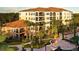 Multi-story building with pool and landscaping at 8763 Worldquest Blvd # 5406, Orlando, FL 32821