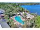 Large pool, beach area, and lakefront access from above at 315 Lucaya Loop # 315, Davenport, FL 33897