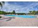 Resort-style pool with plenty of lounge chairs at 315 Lucaya Loop # 315, Davenport, FL 33897