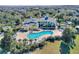 Aerial view showing a large freeform community pool and surrounding recreational area at 315 Lucaya Loop # 315, Davenport, FL 33897