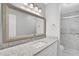 Bathroom with granite countertop and updated vanity at 540 Orange Dr # 13, Altamonte Springs, FL 32701