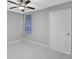 Bedroom with ceiling fan and window with blinds at 540 Orange Dr # 13, Altamonte Springs, FL 32701