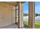 Screened porch overlooking a lake, offering peaceful views and outdoor relaxation at 540 Orange Dr # 13, Altamonte Springs, FL 32701