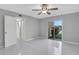 Bright bedroom with ceiling fan, tiled floors and sliding glass door at 540 Orange Dr # 13, Altamonte Springs, FL 32701
