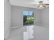 Spacious bedroom with lake view and sliding door access at 540 Orange Dr # 13, Altamonte Springs, FL 32701