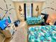 bedroom with twin beds and nautical-themed decor at 4805 Clock Tower Dr, Kissimmee, FL 34746