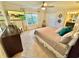 Comfortable main bedroom features a king bed and large TV at 4805 Clock Tower Dr, Kissimmee, FL 34746
