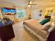 Spacious main bedroom with a king bed and large window at 4805 Clock Tower Dr, Kissimmee, FL 34746