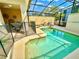 Private screened pool with spa and patio at 4805 Clock Tower Dr, Kissimmee, FL 34746