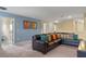 Upstairs living area with sectional sofa and plenty of pillows at 1424 Rolling Fairway Dr, Davenport, FL 33896