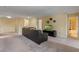 Shared living space with sectional sofa and access to bedrooms and bath at 1424 Rolling Fairway Dr, Davenport, FL 33896