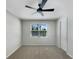 Bright bedroom with neutral walls, carpeting, and ceiling fan at 273 Summershore Dr, Auburndale, FL 33823