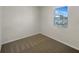 Bright bedroom with neutral walls and window at 273 Summershore Dr, Auburndale, FL 33823
