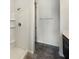 Bathroom with shower, vanity, and dark brown cabinets at 273 Summershore Dr, Auburndale, FL 33823