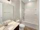 Bathroom with tub, vanity, and neutral decor at 273 Summershore Dr, Auburndale, FL 33823
