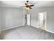 Spacious bedroom with carpet flooring and ceiling fan at 10888 Eclipse Lily Way # 62A, Orlando, FL 32832