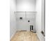 Functional laundry room with tile flooring and shelving at 10888 Eclipse Lily Way # 62A, Orlando, FL 32832