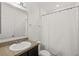 Simple bathroom with a tub and shower at 1100 James Way, Kissimmee, FL 34759