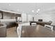 Spacious kitchen with dark cabinets, stainless steel appliances, and an island at 1100 James Way, Kissimmee, FL 34759