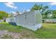 Side view of the mobile home showcasing its exterior features at 1825 Ruby St, Lakeland, FL 33815