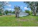 Single-wide mobile home with side yard at 1825 Ruby St, Lakeland, FL 33815