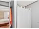Clean bathroom with a shower and white curtain at 1825 Ruby St, Lakeland, FL 33815