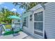 Cozy deck with a table and chairs, perfect for outdoor dining at 1825 Ruby St, Lakeland, FL 33815