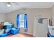 Small bedroom with a window and storage containers at 1825 Ruby St, Lakeland, FL 33815