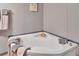 Corner bathtub with ample space for relaxation at 1825 Ruby St, Lakeland, FL 33815