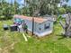 Mobile home with deck and storage shed at 1825 Ruby St, Lakeland, FL 33815
