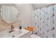 Clean bathroom with updated vanity and shower at 1825 Ruby St, Lakeland, FL 33815