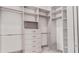 Large walk-in closet with ample shelving and hanging space at 1077 Sugar Loaf Key Loop, Lady Lake, FL 32159