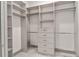 Large walk-in closet with ample shelving and hanging space at 1077 Sugar Loaf Key Loop, Lady Lake, FL 32159