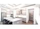 Modern kitchen with white cabinets, large island, stainless steel appliances at 1077 Sugar Loaf Key Loop, Lady Lake, FL 32159