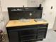 Garage workspace with pegboard and Husky workbench at 1077 Sugar Loaf Key Loop, Lady Lake, FL 32159