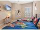 bedroom with twin beds and Marvel theme at 7571 Sunny Dreams Ln, Kissimmee, FL 34747