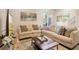 Spacious living room with two sofas and a coffee table at 7571 Sunny Dreams Ln, Kissimmee, FL 34747