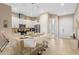 Modern kitchen with island and stainless steel appliances at 7571 Sunny Dreams Ln, Kissimmee, FL 34747