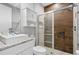 Bathroom with a walk-in shower and granite countertop at 7571 Sunny Dreams Ln, Kissimmee, FL 34747