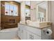 Modern bathroom with double vanity and shower at 7571 Sunny Dreams Ln, Kissimmee, FL 34747