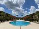 Resort-style pool with two gazebos and fountain at 5518 Metrowest Blvd # 207, Orlando, FL 32811