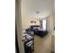 Cozy bedroom with a queen-size bed and a window at 5518 Metrowest Blvd # 207, Orlando, FL 32811