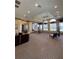 Spacious lobby with comfortable seating and large windows at 5518 Metrowest Blvd # 207, Orlando, FL 32811