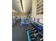 Fitness room featuring dumbbells and weight machines at 5518 Metrowest Blvd # 207, Orlando, FL 32811