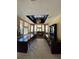 Large community room with tables, seating, and a TV at 5518 Metrowest Blvd # 207, Orlando, FL 32811