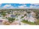 Aerial view of neighborhood with houses and trees at 1450 Cricket Ct, Longwood, FL 32750