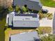 Home with solar panels on the roof, viewed from above at 132 Meadow Blvd, Sanford, FL 32771