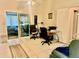 Home office with two desks and sliding glass doors at 132 Meadow Blvd, Sanford, FL 32771