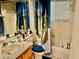 Bathroom with shower/tub combo and updated vanity at 132 Meadow Blvd, Sanford, FL 32771
